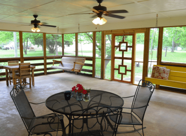 Screened in porch and furniture at the Fuller House